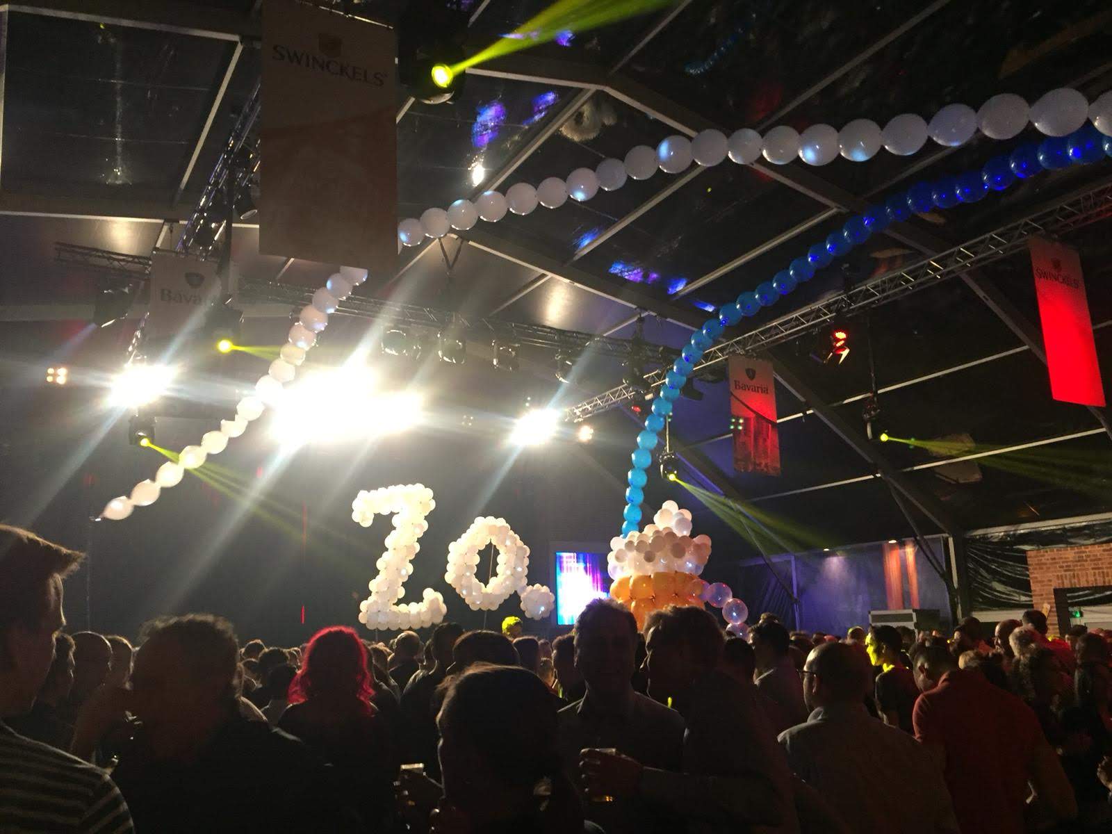 Crowd reacting to large balloon ZO letters during the Bavaria 300 Jaar brand activation in Lieshout (2019)