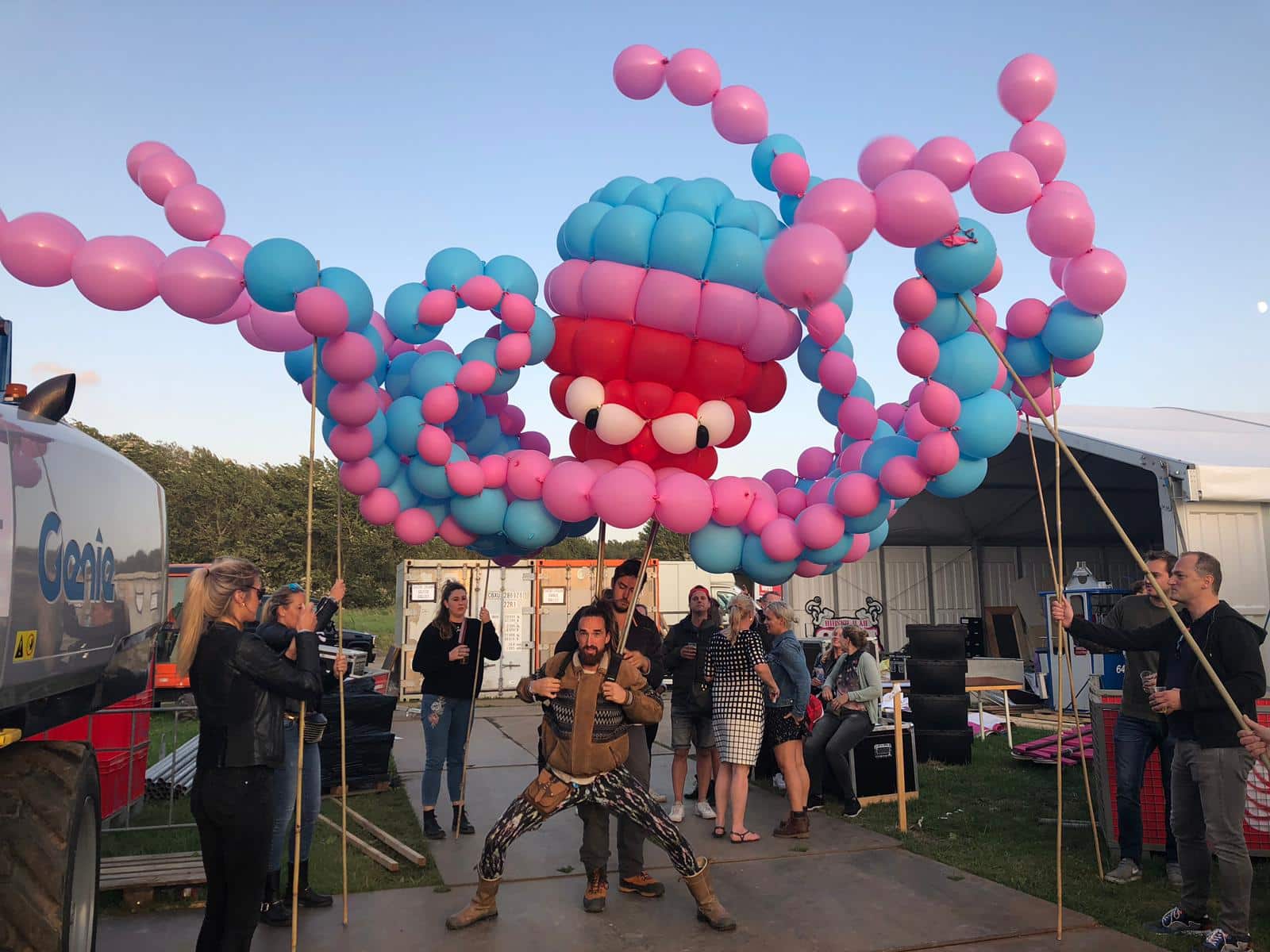 Pink and blue giant kraken balloon octopus with crew backstage — Titans of Air (2019)